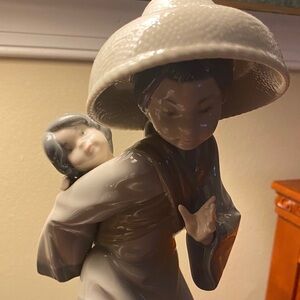 Lladro Figurine of Woman Carrying Child - Cream and Brown
